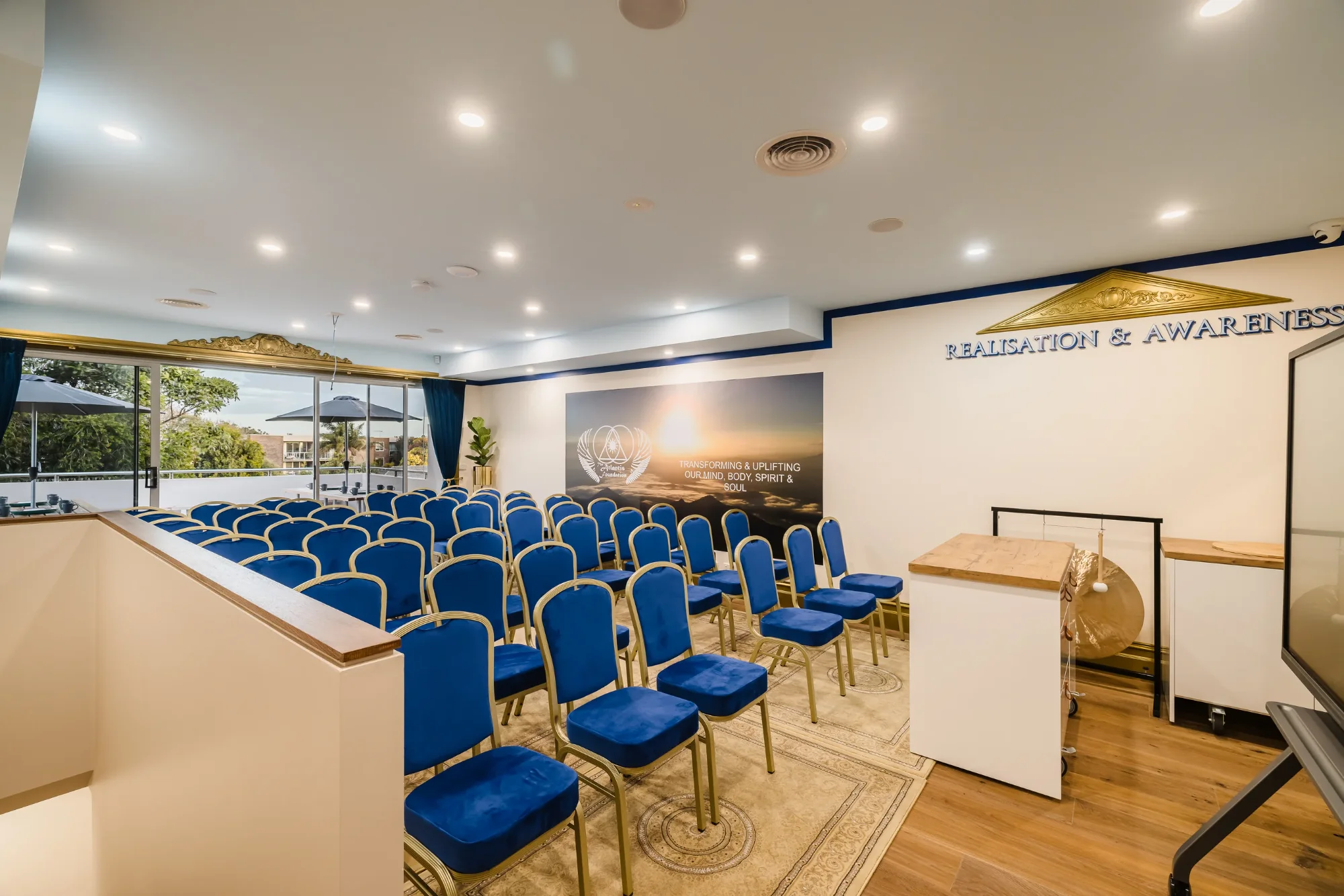 The blue and gold auditorium at Atlantis Centre