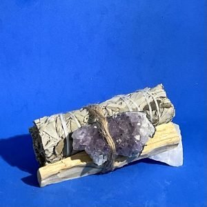 Sage with cleansing stick and crystal