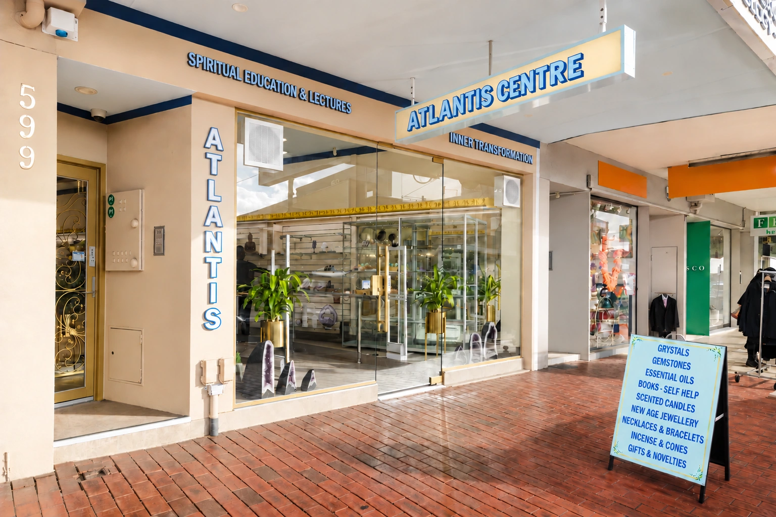 Atlantis Centre and Crystal Gift Shop entrance with signage for spiritual education, lectures and inner transformation